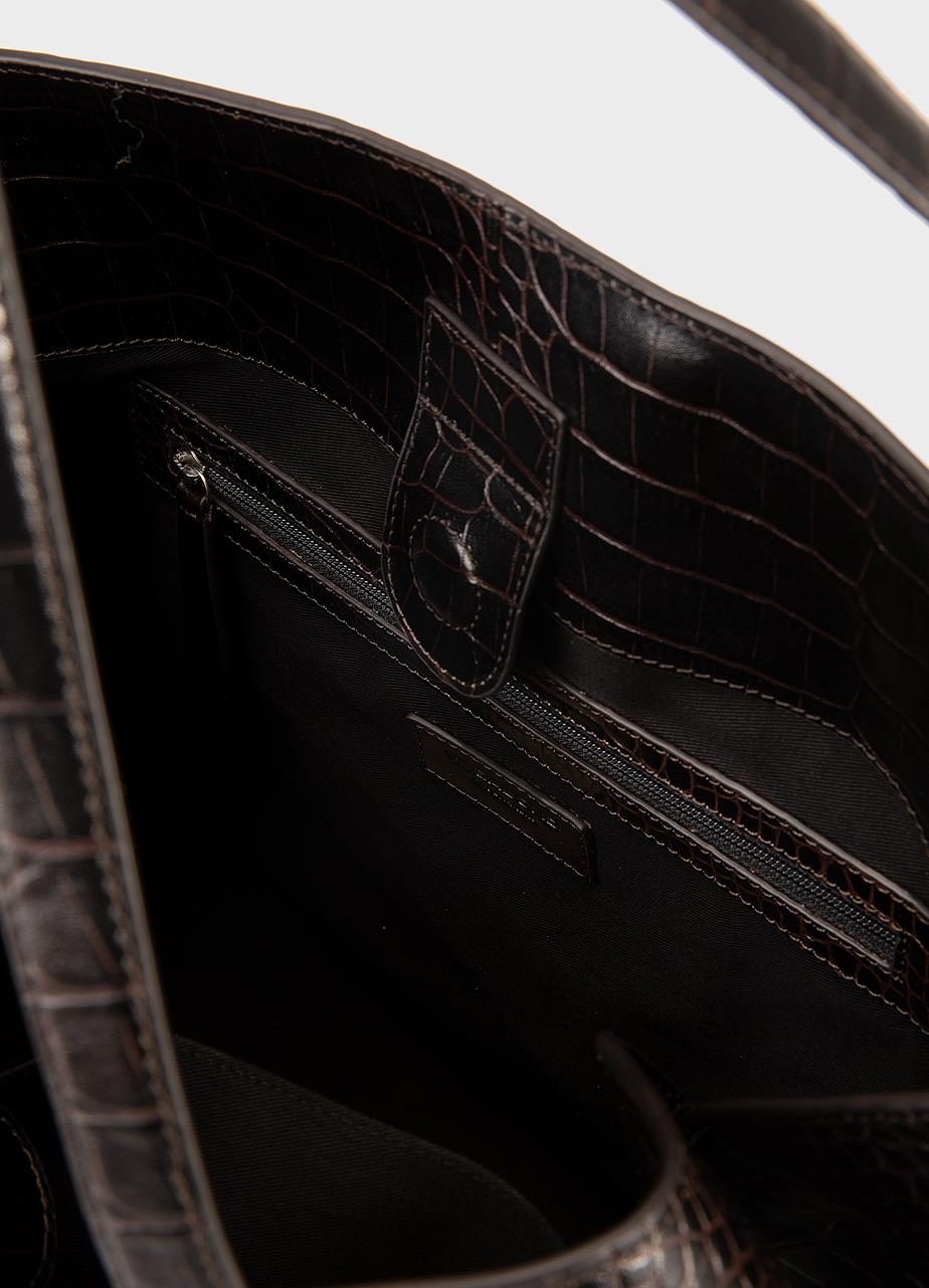 Vagabond Cannes, preget mørkebrun